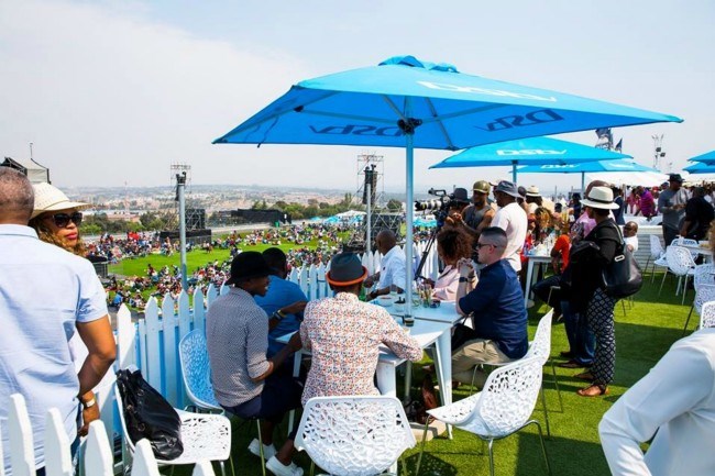 DSTv delicious food festival people sitting at table socialising