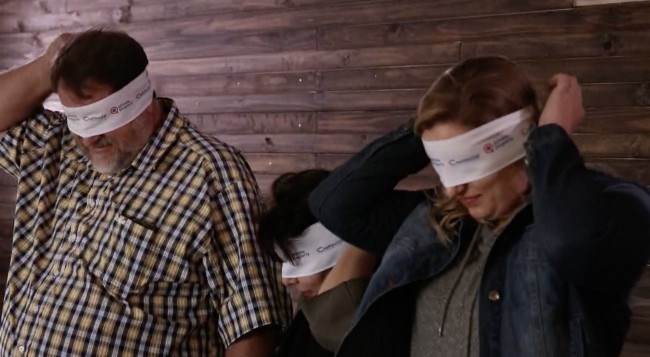 family blindfolded waiting for the big reveal