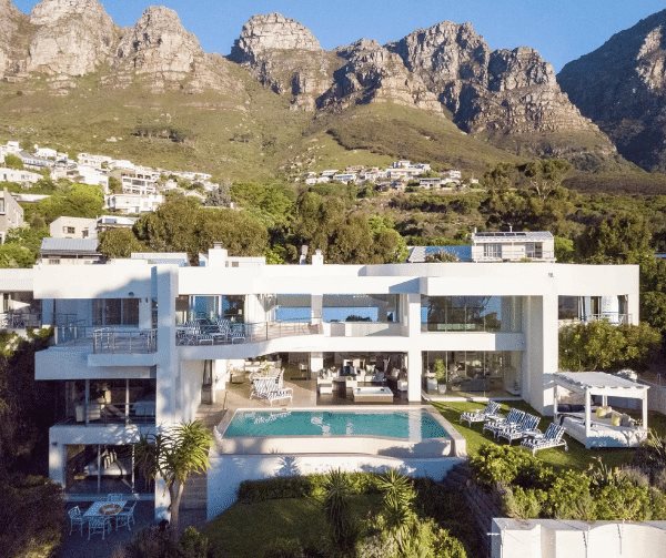 Glamourous 6 bedroom mansion in Camps Bay that features a large infinity pool and a large outdoor space. This home is known as one of the largest homes in Camps Bay.