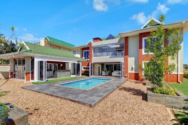 Beautiful mansion located in the eco-friendly Kindlewood Estate. The home has a pool and a large front yard which is perfect for entertaining.