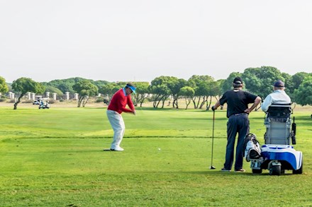 Playing golf in Langebaan