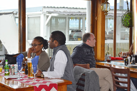 People at the Brass Bell restaurant in False Bay