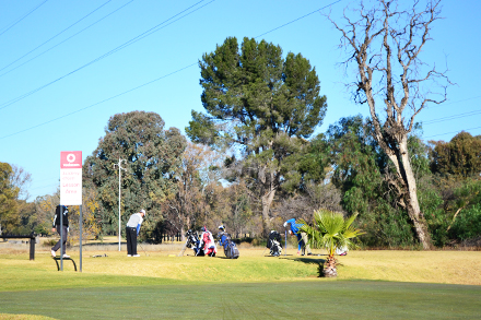 Playing golf at Bloemfontein Golf Course in Bloemfontein