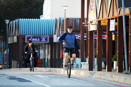 Cycling on the street in Mossel Bay to Glentana