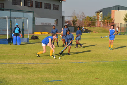 Girls playing hockey in Pretoria East (South)